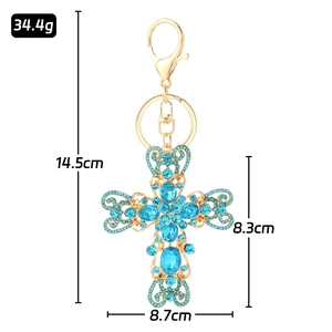 Porte-clés croix coeur doré avec cristaux bleu ciel et fermoir mousqueton, 14.5cm