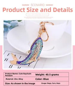 Detailed view of dolphin keychain made of zinc alloy with blue and white rhinestones