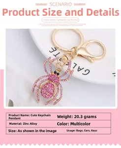Detailed view of gold spider keychain with pink rhinestones and product weight of 20.3g
