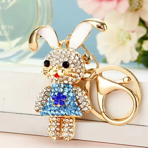 Sparkling crystal rabbit keychain with blue flower pattern and gold metal ring