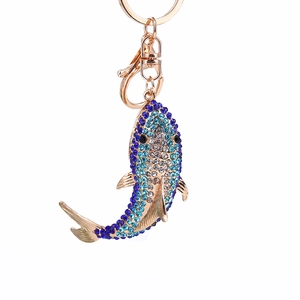 Sparkling crystal shark keychain with blue rhinestones and gold-plated lobster clasp