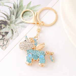 Golden unicorn keychain pendant with sparkling blue rhinestones and elegant enamel detail