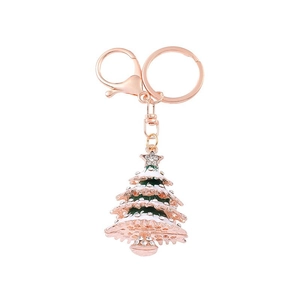 Detailed macro of crystal-encrusted Christmas tree keychain with colorful enamel coating