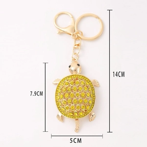 Porte-clés tortue marine étincelant avec cristaux jaunes et fermoir en métal doré