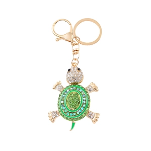 Golden turtle keychain with green and blue crystals and sparkling rhinestones