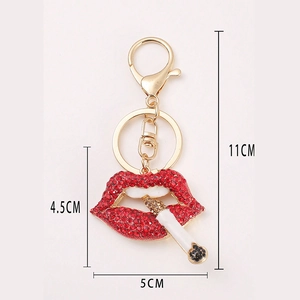 Sparkling red crystal smoking lips keychain in gold finish with precise measurements