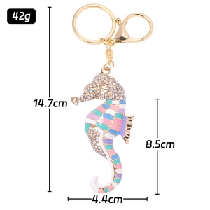 Golden seahorse keychain with colorful enamel and sparkling rhinestones for bags