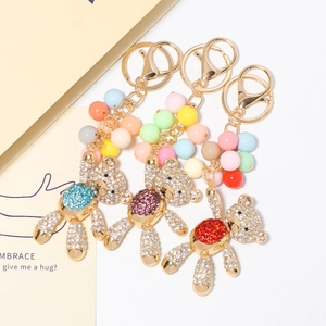 Set van beer sleutelhangers met kleurrijke strass steentjes en macaron kralen cadeau