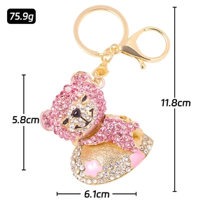 Portachiavi orsetto di cristallo con strass rosa e ciondolo a forma di fiore