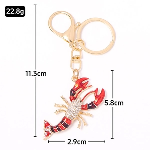 Porte-clés homard doré avec émail rouge et cristaux brillants pour décoration de sac