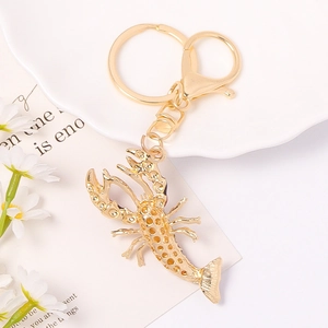 Porte-clés homard doré avec strass et fermoir mousqueton en alliage métallique robuste