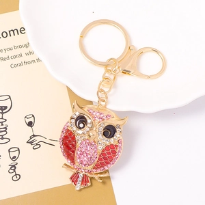 Exquisite gold alloy owl keychain with sparkling pink and red rhinestones and lobster clasp