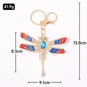 Luxurious dragonfly crystal keychain with blue rhinestones and colorful enamel wings