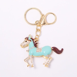 Porte-clés cheval bleu ciel avec placage d'or et strass étincelants pour sacs à main
