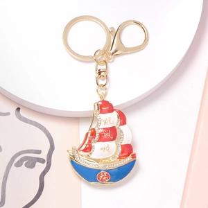 Sailing boat keychain with rhinestones and enamel smooth sailing calligraphy charm