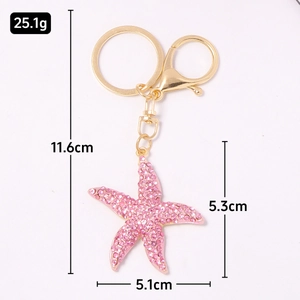 Pink starfish crystal keychain with gold metal ring and rhinestone accents for teachers