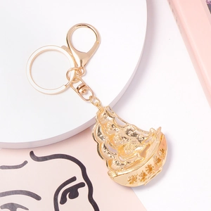 Golden sailboat keychain with traditional Chinese design and shiny rhinestones