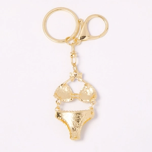 Golden metal bikini swimsuit keychain with embossed texture and swivel lobster clasp