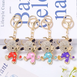 Sparkling rhinestone calf keychains in four colors with gold-plated metal clasp set