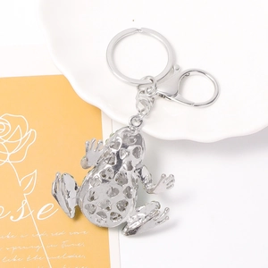 Creative silver hollow frog keychain with green rhinestones and metal ring set