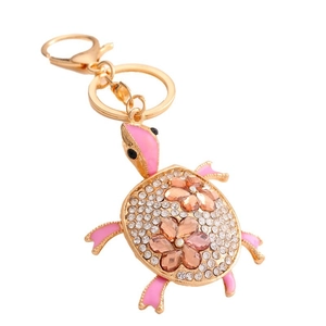 Zinc alloy sea turtle keychain with pink enamel and sparkling rhinestone flower design