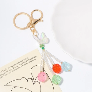 Acrylic butterfly crystal keychain with colorful flower beads and golden lobster clasp