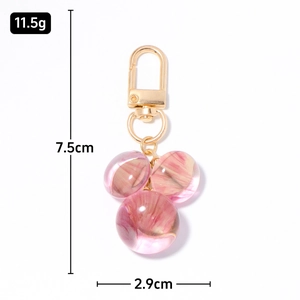 Porte-clés perles de marbre rose pour sac dimensions 7,5cm x 2,9cm avec fermoir doré