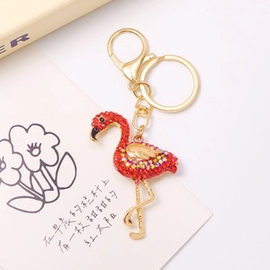 Sparkling flamingo keychain with colorful rhinestones on a gold-plated metal frame
