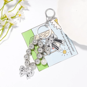 Portachiavi alla Moda con Fiocco e Perline in Lega di Zinco Placcato Argento Cuore Perla Artificial d'Imitazione Pendente Ciondolo per Borsa Donna