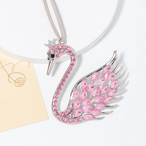 Elegant silver swan pendant with pink crystals and crown on silk cord hanging