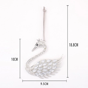 Swan metal pendant with sparkling rhinestones and crown detail, dimensions 10x9.5 cm