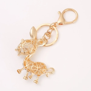 Porte-clés âne en cristal doré à l'or champagne avec design évidé et perle élégante