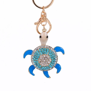 Exquisite turtle keychain with blue and white crystals and golden lobster clasp