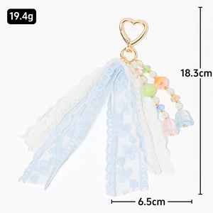 Lace flower and pearl keychain with heart metal clasp and blue resin floral beads