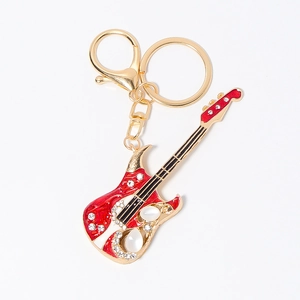 Sparkling electric guitar keychain with red enamel and white cat-eye stones for bags