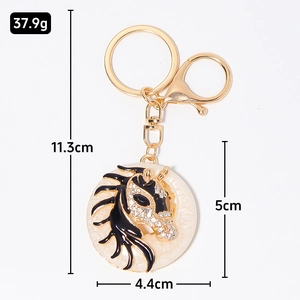 Golden horse head keychain with white rhinestones and enamel pendant, 11.3cm length