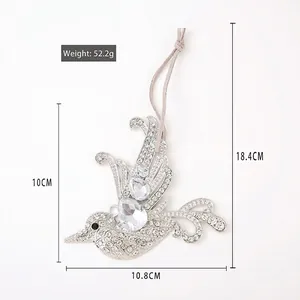 Detailed view of rhinestone bird ornament with dimensions and weight measurements