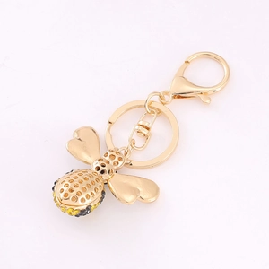 Exquisite gold-plated bee keychain with sparkling rhinestones and hollow wing design