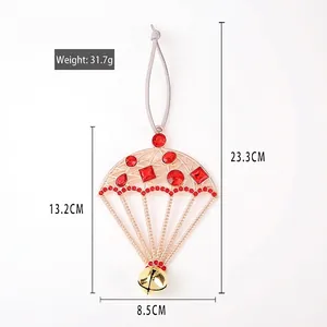 Golden metal parachute Christmas tree pendant with red rhinestones and a hanging bell