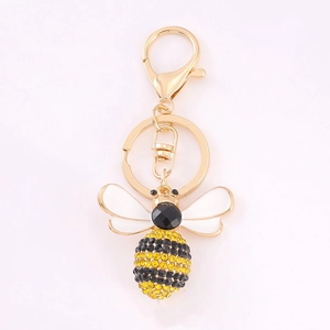 Golden rhinestone honey bee keychain with white enamel wings and lobster clasp pendant