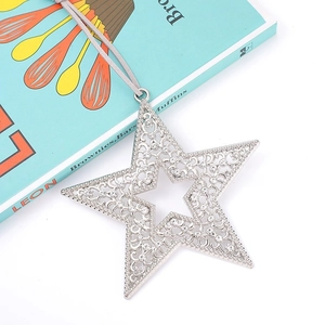 Elegant hollow star pendant with sparkling rhinestones and silver finish on book