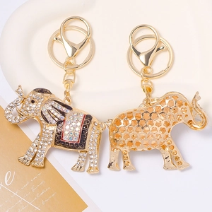 Enamel Thai elephant keychain with sparkling rhinestones and golden metal hardware