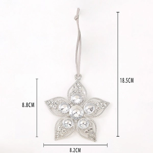 Close-up of sparkling rhinestone star pendant with silver frame and size markings