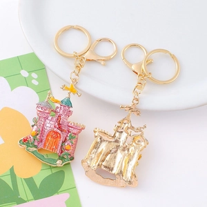 Pink enamel fairy castle keychain with sparkling rhinestones and gold lobster clasp