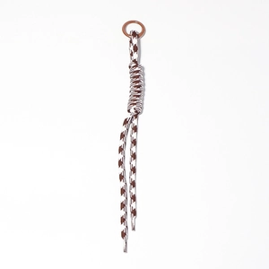 Brown houndstooth braided phone lanyard with bronze metal ring on white background