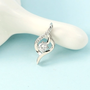 Elegant wave design silver pendant with sparkling main diamond and small side stones