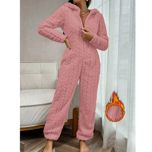 Pink hooded coral fleece onesie with cable knit texture for winter home comfort