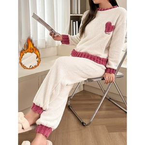 Women's warm coral fleece pajama set in cream and pink with heart embroidery detail