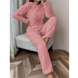 Pink coral fleece hooded jumpsuit for women featuring thick thermal corn kernel texture