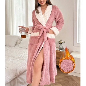 Thick pink coral fleece bathrobe with white contrast collar and plush warmth details